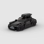 SHIELD Power 6, maquette de break de sport noir en briques Mabric™ avec coffre de toit