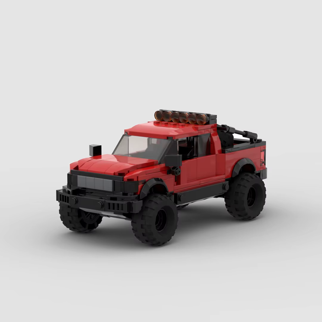RUMBLE Outland, maquette de pick-up tout-terrain rouge en briques Mabric™ avec pare-buffle