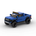 RUMBLE Outland, maquette de pick-up tout-terrain bleu en briques Mabric™ avec rampe de phares