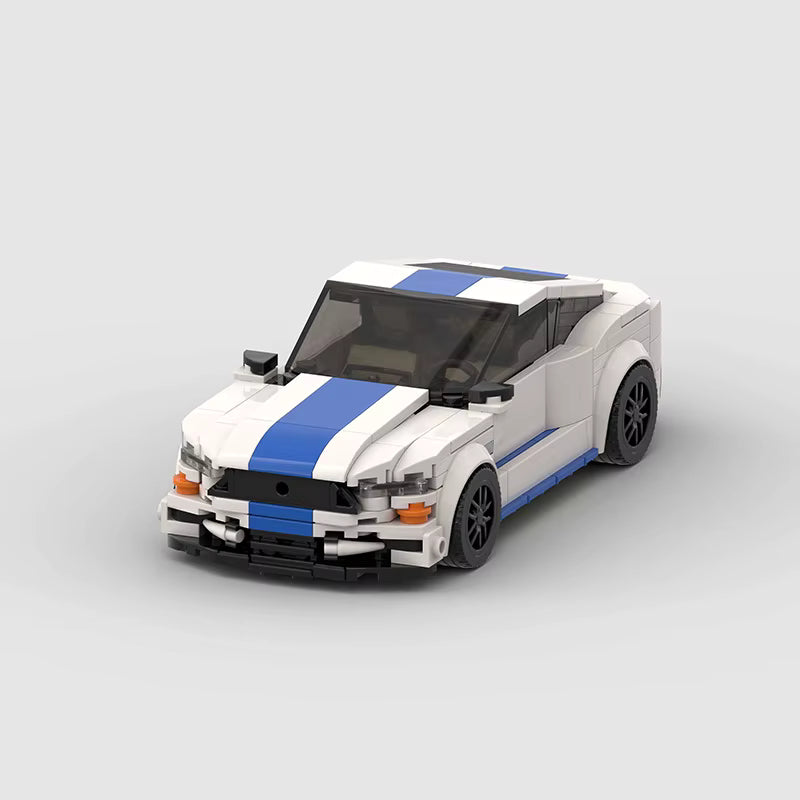 RUMBLE Freedom 2GEN, maquette de coupé américain blanc à bandes bleues en briques Mabric™
