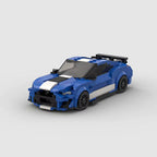 RUMBLE Freedom Gale, maquette de coupé américain bleu racing à bandes blanches en briques Mabric™